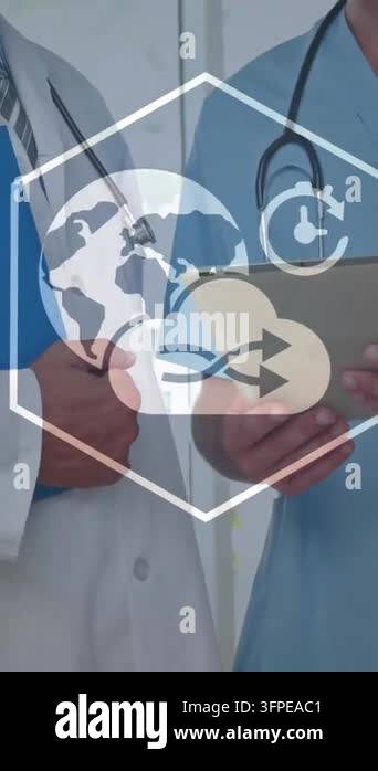 Animation of business icons over caucasian male doctors using tablet ...
