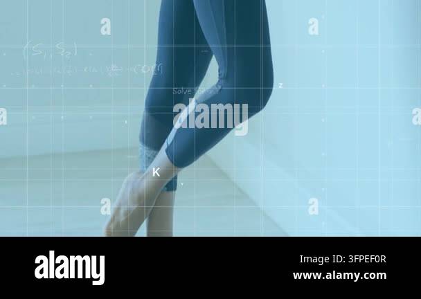 R Studio For Math Woman practicing barre fitness beginning with heel lifts, holding barre ...