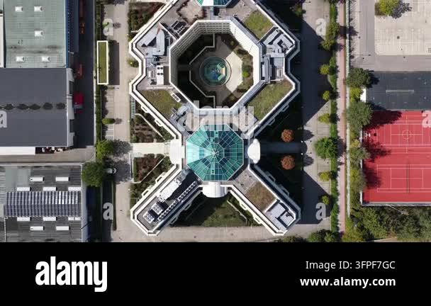 Aerial drone view of a modern X-shaped office complex in Munich ...