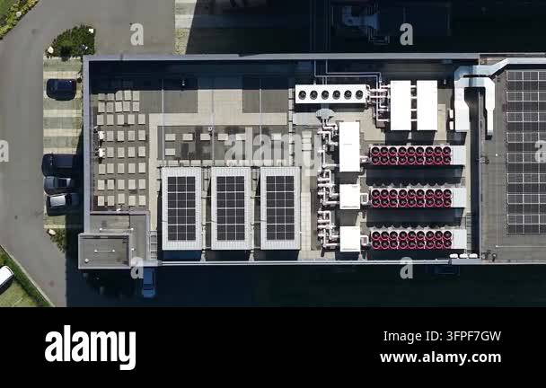 Aerial view of rooftop HVAC cooling systems on a commercial data center ...