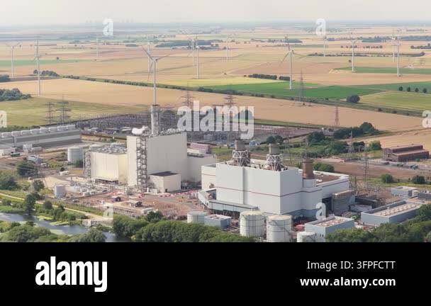 Folder Rack Tall An aerial perspective captures a sprawling industrial power facility ...