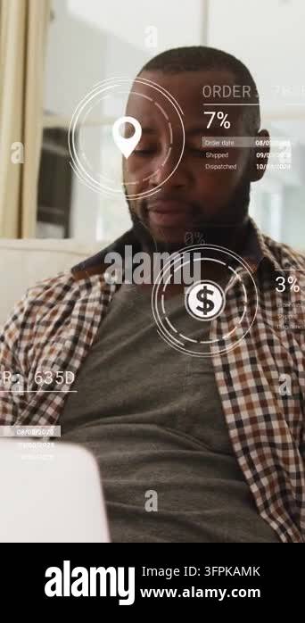 Vertical video: Mature man using laptop in living room, AR HUD ...
