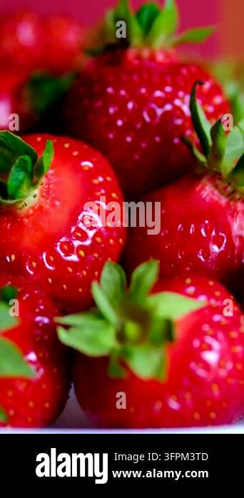 Juicy ripe strawberries rest clean white plate, highlighting their ...