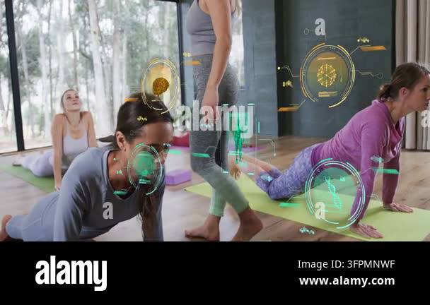 Teacher walking among mats, initiating yoga pose shifts while AR HUD ...
