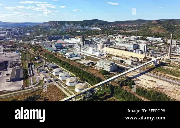 Large Area Factories and storage tanks are visible in a large industrial area. The ...