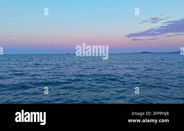Html Olors The view shows the sea at twilight with soft colors in the sky. The ...
