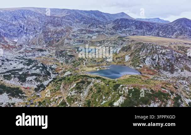 Large Area Large mountains surrounding two lakes in a remote area. The rocky ...