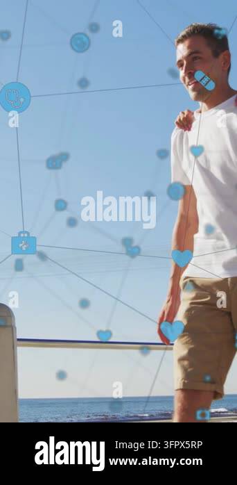 Vertical video: Couple piggybacking along sea, blue tech icons drifting ...