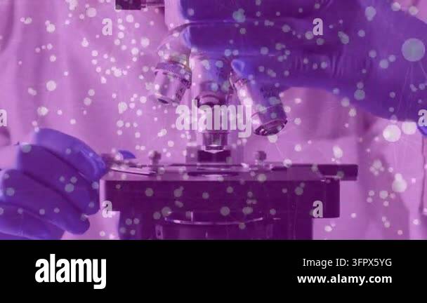 Objective Lens Model Lab tech reaching gloved hand, rotating turret aligning 40x objective ...