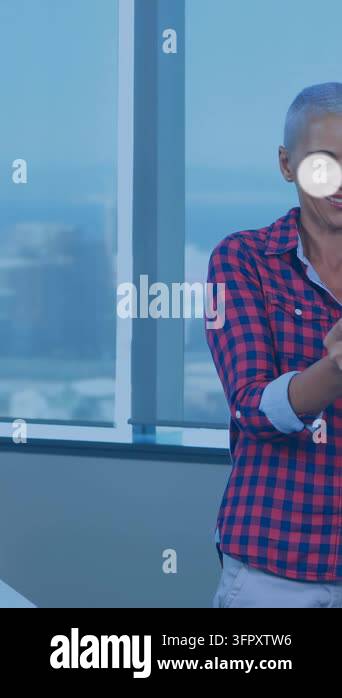 Vertical video: Woman tapping phone by window making icons linking into ...