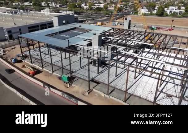 Construction site with steel framework of a building under development ...