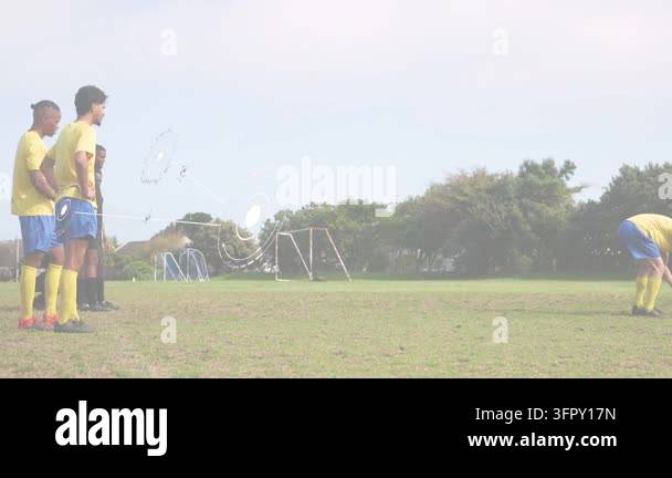 Sports player running up, striking ball to score, HUD tracking ...