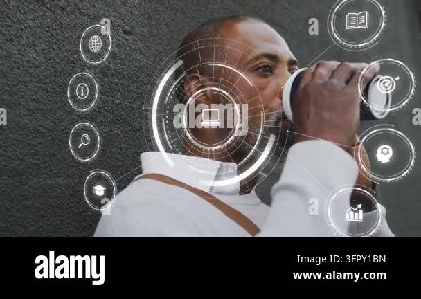 Mature man drinking travel cup answering ringing phone while AR tech ...