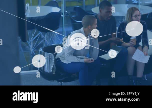 Business team exchanging phone and papers in lounge initiating overlay ...