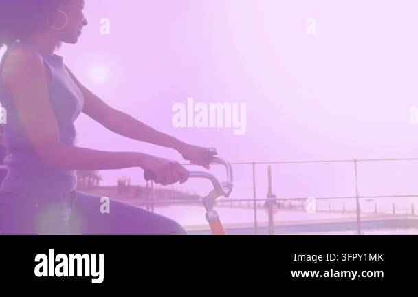 Vector For Riders Vertical video: Riding woman in tank holding bars on bay path for fun ...