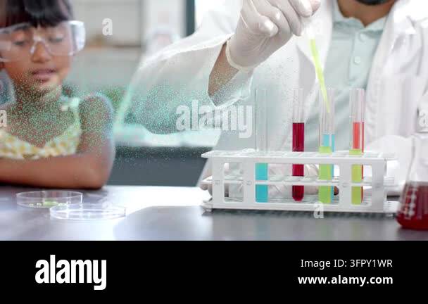 Dna Samples Examples Science teacher dipping pipette into tubes, moving sample to petri ...