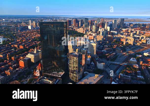 John Hancock Tower above Boston with downtown and harbor in the ...