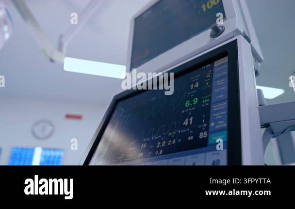 Medical Instrument Signage Two monitors of the Lung ventilating machine with life signs. Low angle ...