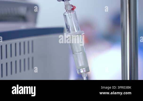 Medical Instrument Signage Saline solution drips in the drop counter. Close up. Medical equipment ...