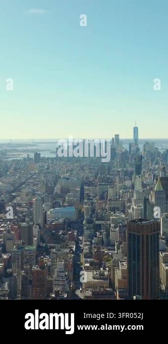 Vertical video: Aerial panoramic view of cityscape. Skyline with ...