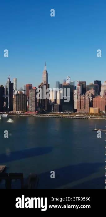 Vertical video: Breathtaking Midtown Manhattan skyline from a high rise ...