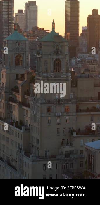 Vertical video: Aerial views showcase sun setting behind the iconic ...