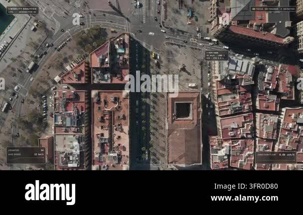 Top down aerial flyover of Barcelona: busy old town intersection at Via ...