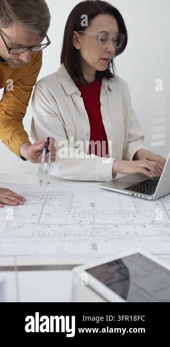 Architects team collaborating on new urban development project ...