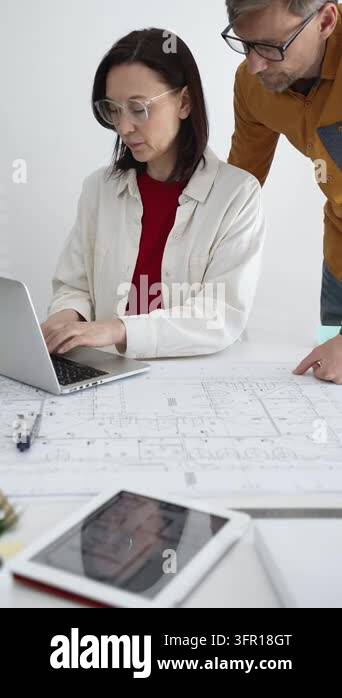 Architects team collaborating on new urban development project ...