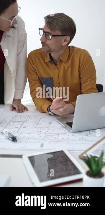 Architects team collaborating on new urban development project ...
