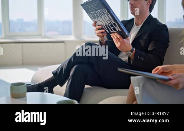 Magazine Photo Frame Elegant man reading interior design book luxury apartment window. Woman ...