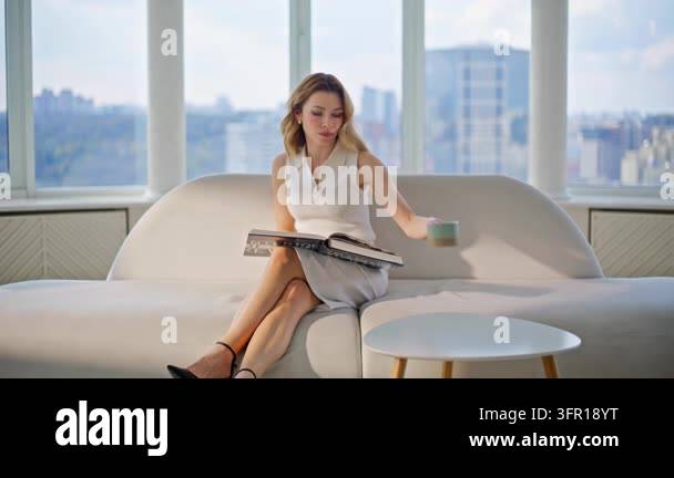 Magazine Photo Frame Young woman resting couch flipping design magazine luxury apartment ...