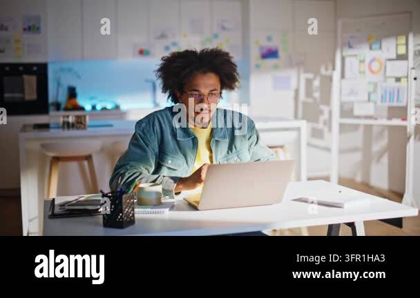 Remote work morning routine home office. African american freelancer ...