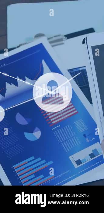Animating tablets and blue charts on desk, hand with light sleeve ...