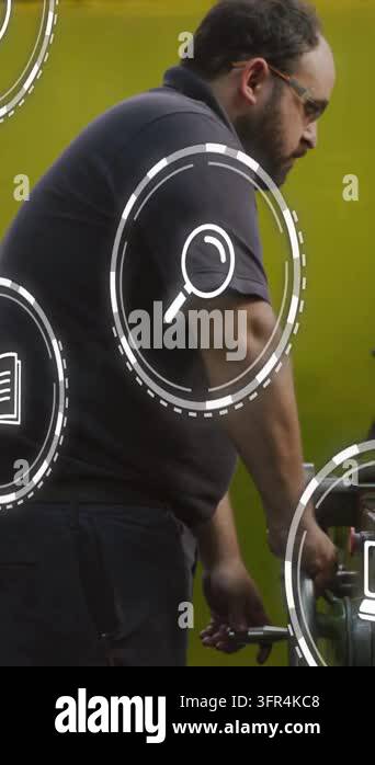 Vertical video: Machinist turning wheel after checking area, animated ...