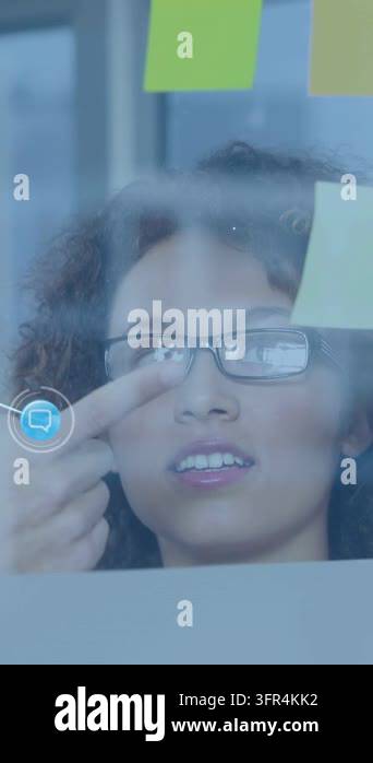 Vertical video: Woman tapping glass and creating animated nodes ...