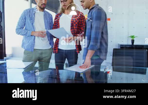 Overlay Html Over Video Three men leaning over glass table, center man presenting paper ...