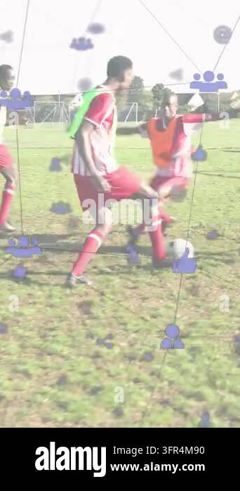 Vertical video: Men on dribble, moving ball toward goal in sports drill ...