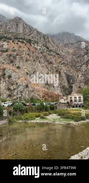Limestone In Rivers Vertical 4K video panning shot of Skurda river, Northern Gate, stone ...