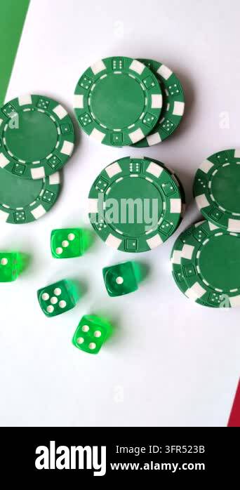 Playing cards, dice and chips on a table, a gambling game of blackjack ...