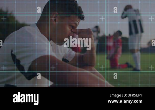 Male soccer player reacting to sports event, lifting hand and focusing ...