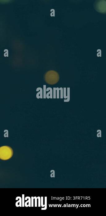 Animation of multiple icon in squares over blurred lights of moving ...