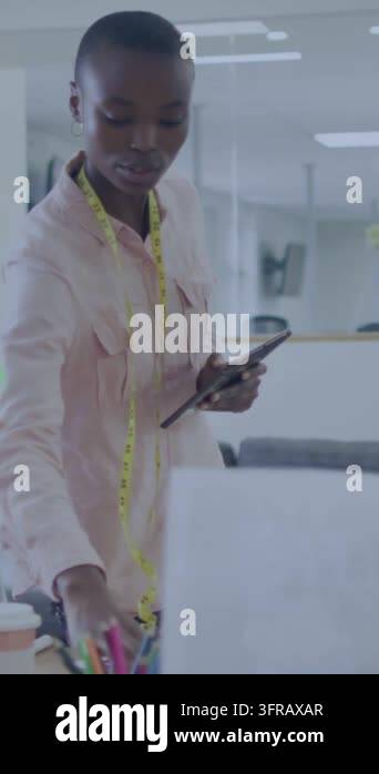 Pc File With Paper In Vertical video: Tailor with tape taking given paper, updating PC with ...