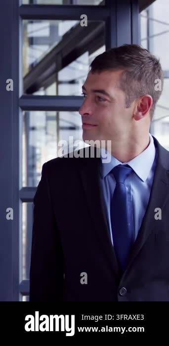 Vertical video: Man in suit turning to talking peer animated icons ...