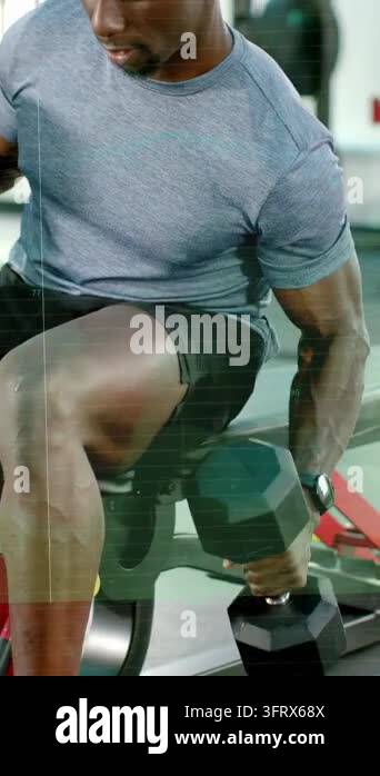 Vertical video: Man reaching to grip dumbbell, pressing reps on bench ...
