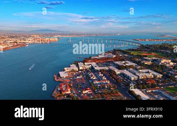 The iconic San Diego-Coronado Bridge over the blue waterscape. Flight ...