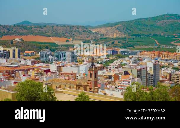 Spanish Mediterranean cityscape with dense urban rooftops and historic ...