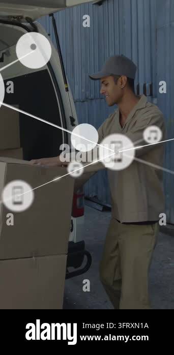 Vertical video: Steadying boxes, man in cap loading into cargo van at ...