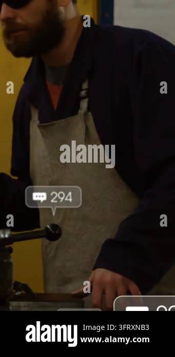 Vertical video: Machinist operating lathe causing overlaying social ...