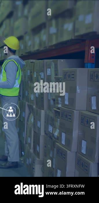 Warehouse worker scanning tablet and creating network icons expanding ...